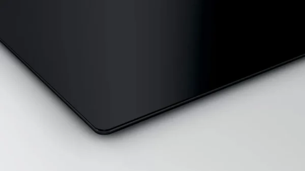 Bosch Série 2 PUG611AA5E A Plaque de cuisson à induction Bosch Série 2 PUG611AA5E noire 60 cm avec 4 zones de cuisson